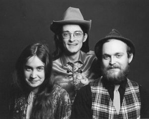  Judith Cook left the band after the first year. She was much missed. They continued as a trio.
